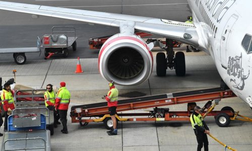 Bùng phát một ổ dịch coronavirus trong số những nhân viên bốc xếp hành lý của hãng Qantas gây ra nhiều lo lắng tại sân bay