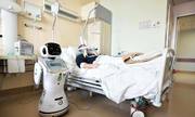 Robot y tá chăm sóc bệnh nhân nCoV